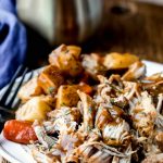 Instant Pot pork roast and vegetables on a stoneware plate