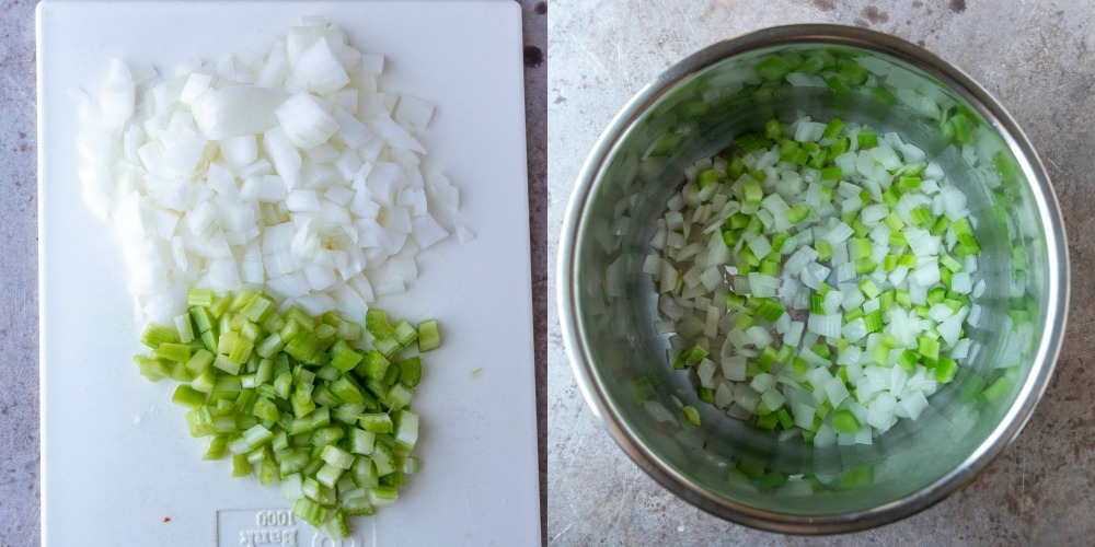 Diced celery and onion on a white cutting board