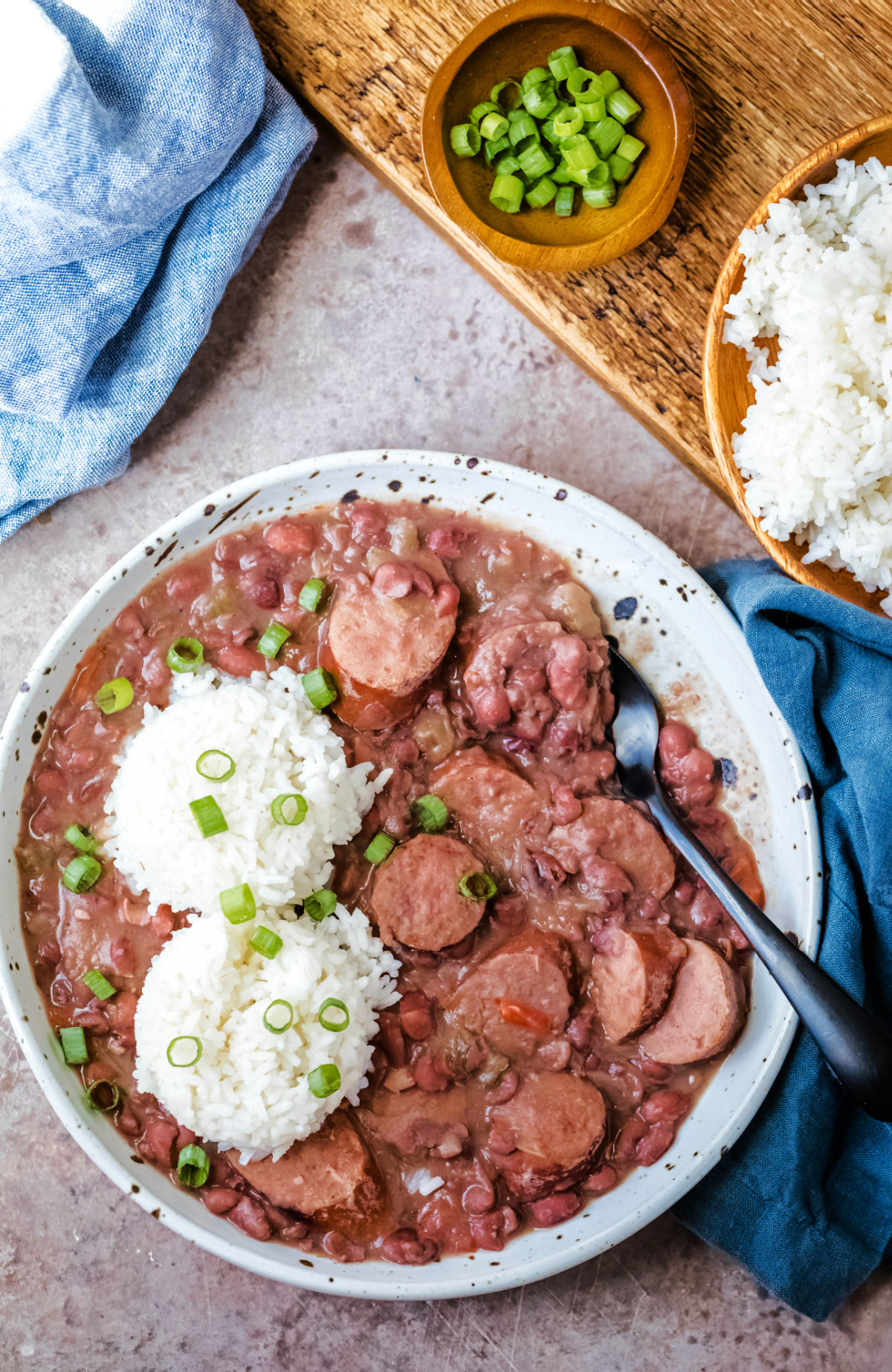 Plate of instant pot red beans and rice topped with two scoops of rice