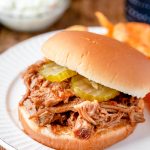 North Carolina pulled pork sandwich topped with pickles