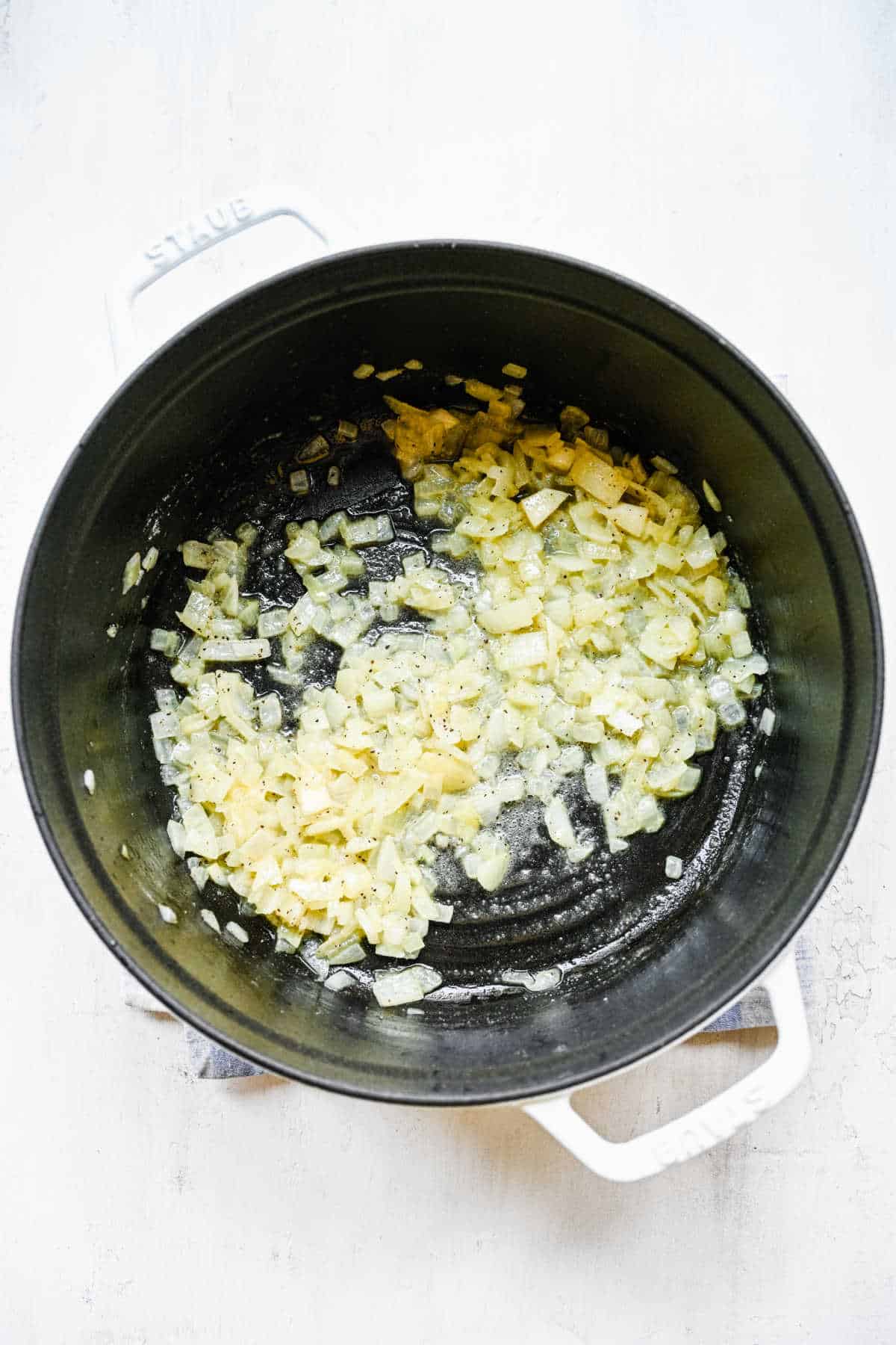 Flour and spices stirred into onion and butter in a Dutch oven.